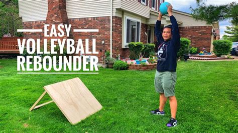 Materials made out of Nylon, plastic and metal. . Volleyball rebounder wood